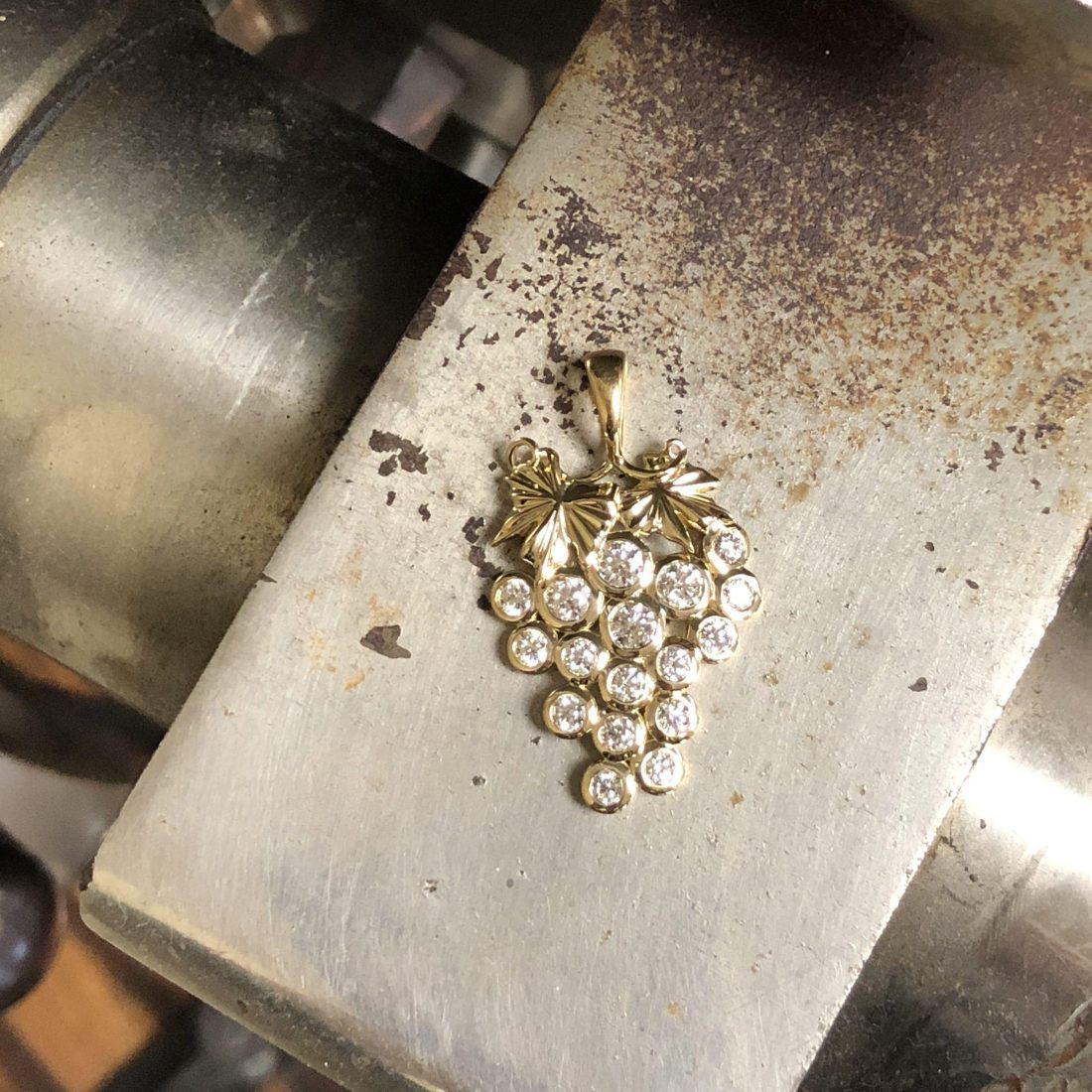 Custom Designed Grape Pendant with diamonds as the grape